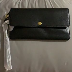Fossil Flap Wristlet